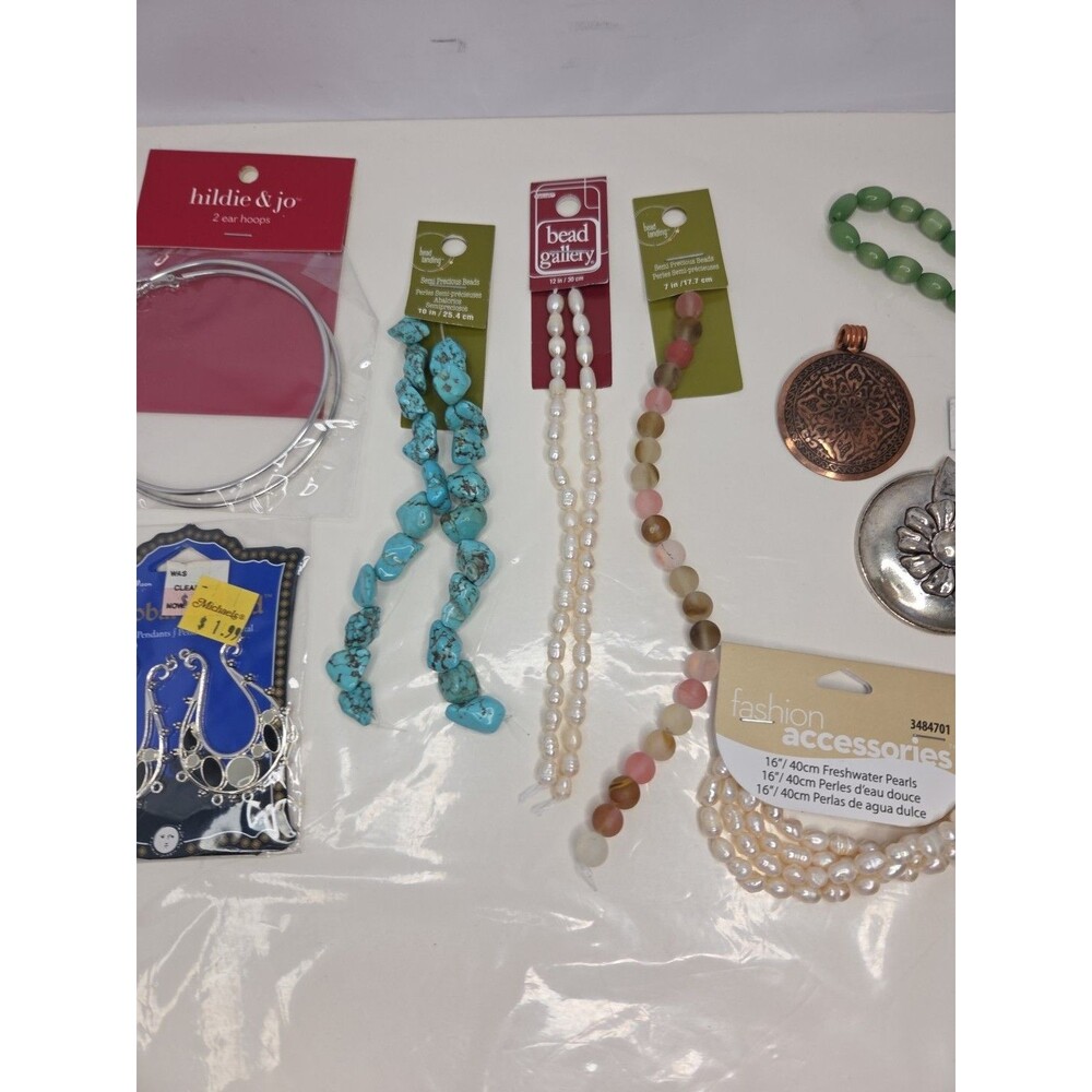 16 Piece New Jewelry making supplies lot: Beads Pendants Most Still In Packaging